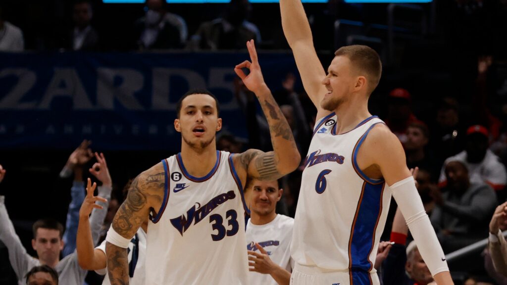 Wizards Kuzma and Porzingis celebrating after a possession