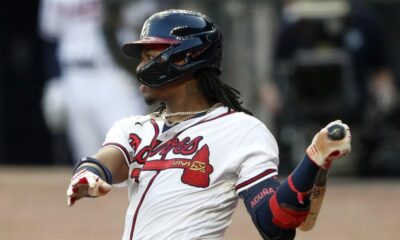 Ronald Acuña swings in a home game for the Atlanta Braves.