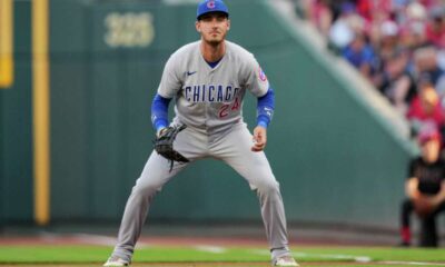 Cody Bellinger stands ready on defense during a road game for the Chicago Cubs.