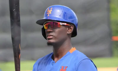 Ronny Mauricio stands during batting practice for the New York Mets.