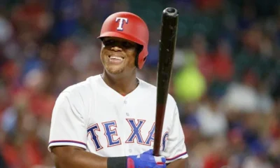 Adrian Beltre smiles in the batter's box during a home game for the Texas Rangers.