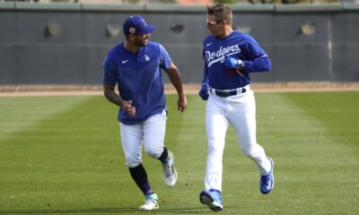 The Los Angeles Dodgers warm up during Spring Training.
