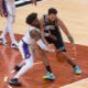 Wesley Matthews and Kyle Anderson struggle for a loose ball.