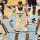 Memphis Grizzlies center Jonas Valanciunas (17) reacts with teammates Brandon Clarke (15) and De’Anthony Melton (0) after scoring in the second half of an NBA basketball game against the Washington Wizards Wednesday, March 10, 2021, in Memphis, Tenn. (AP Photo/Brandon Dill)