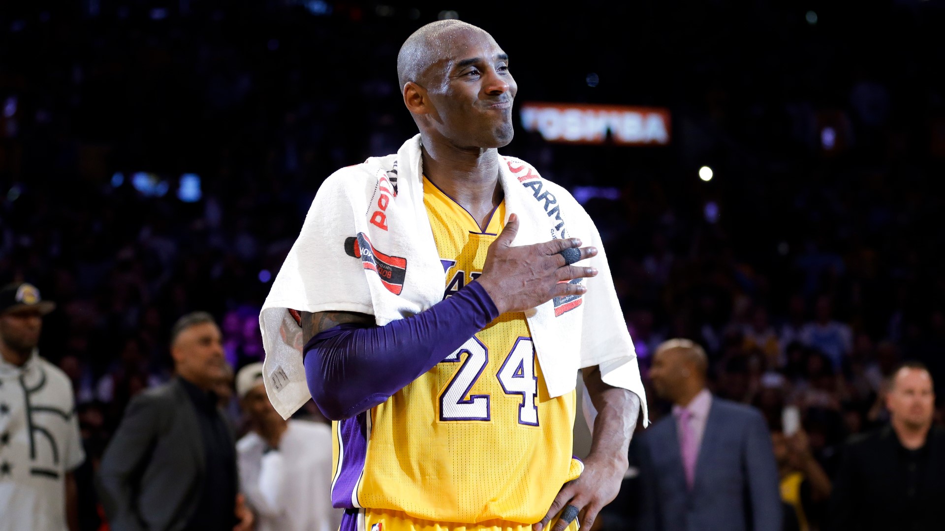 Los Angeles Lakers' Kobe Bryant pounds his chest after the last NBA basketball game of his career