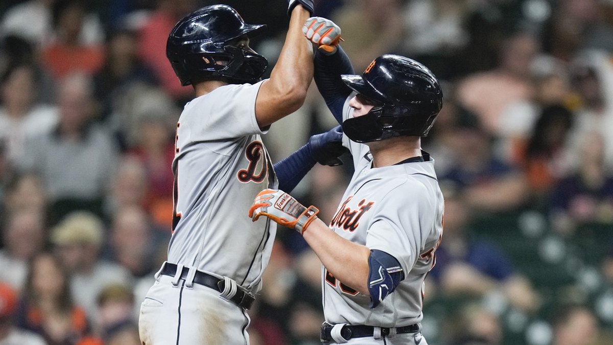 Spencer Torkelson celebrates hitting a home run with teammate Riley Greene against the Houston Astros.