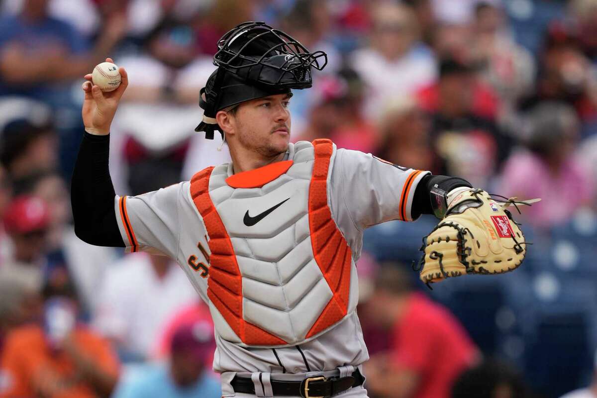 Patrick Bailey throws the ball back to the pitcher while playing for the San Francisco Giants.