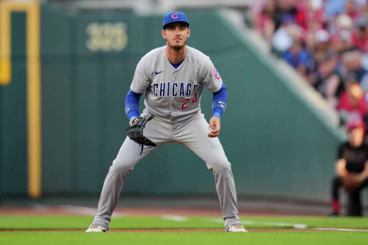 Cody Bellinger stands ready on defense during a road game for the Chicago Cubs.