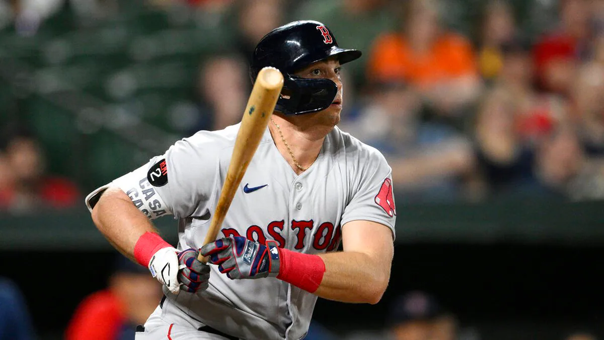 Triston Casas runs to first base after batting on the road for the Boston Red Sox.