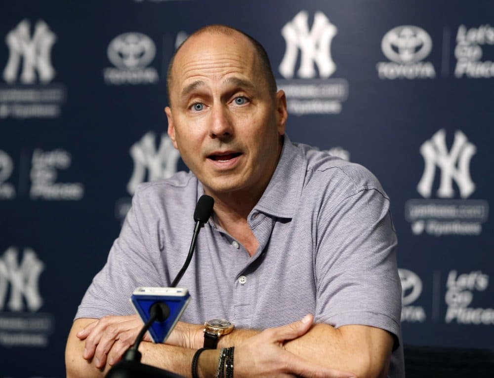 Yankees General Manager Brian Cashman announces his team's trades during a 2017 press conference.