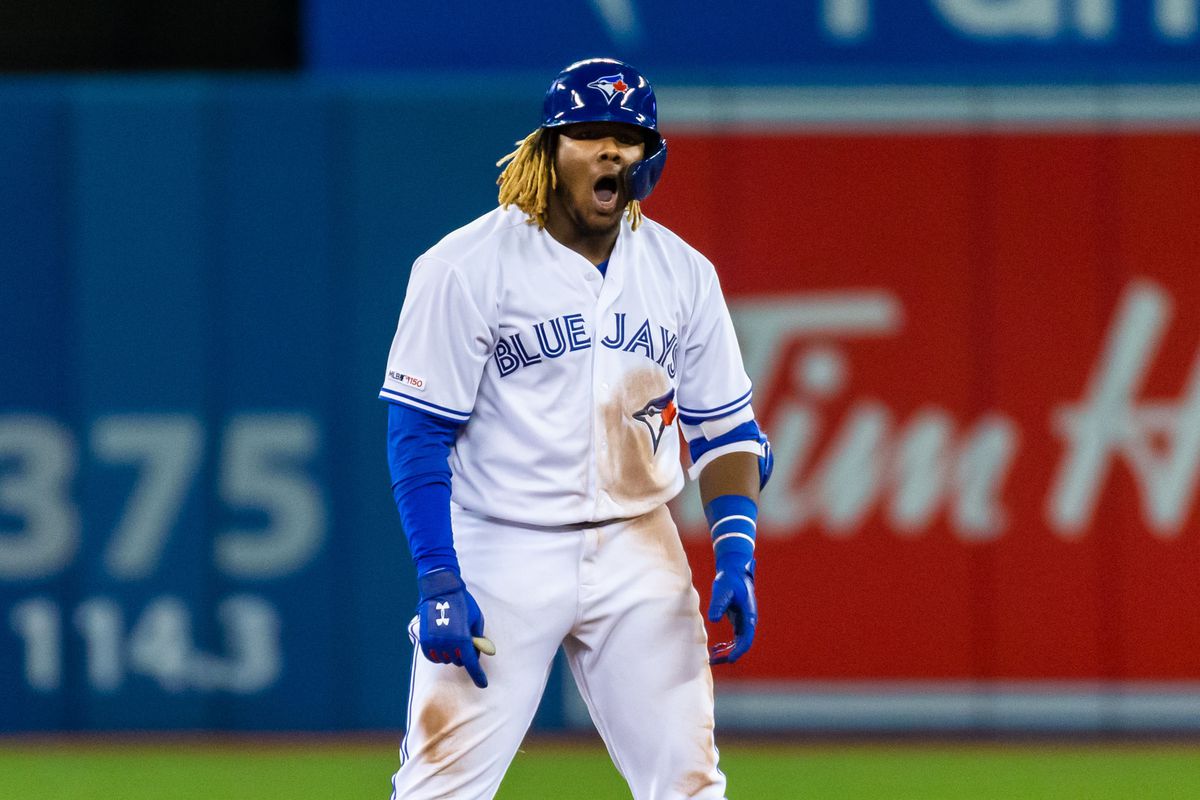 Vlad Guerrero, Jr. celebrates reaching base during a home game for the Toronto Blue Jays.