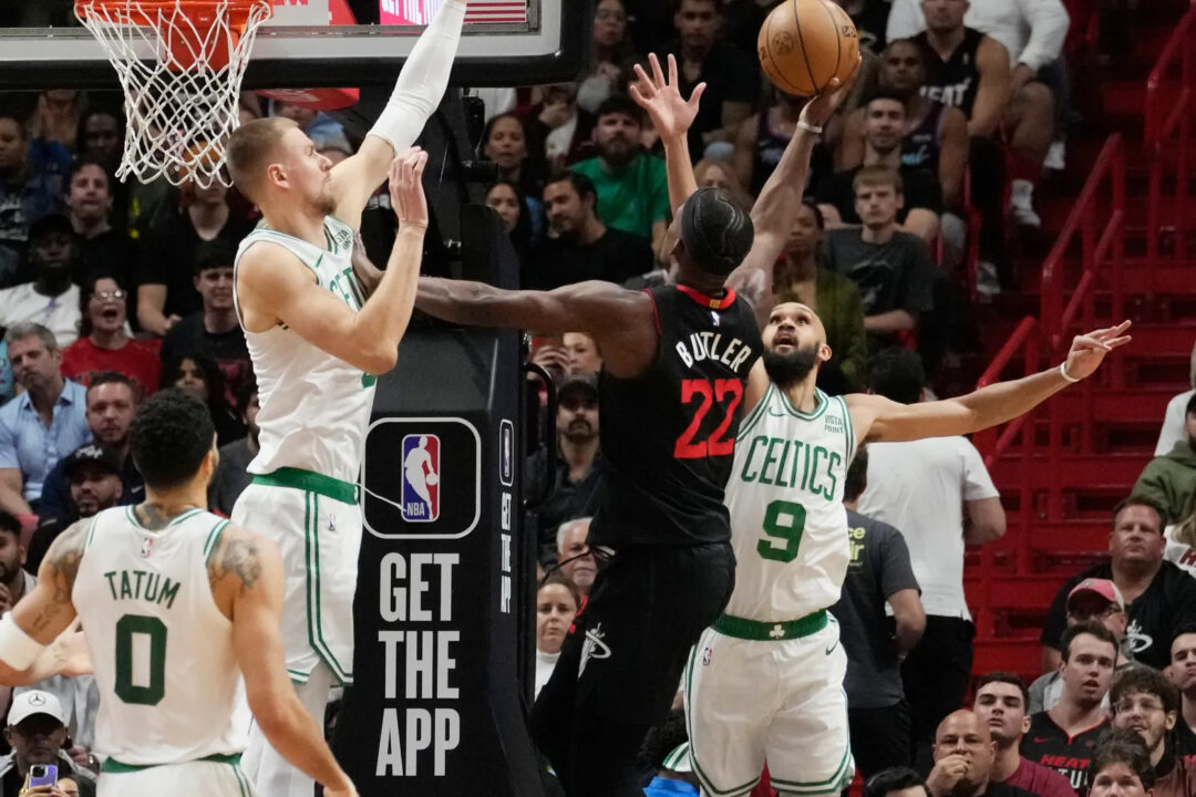 Derrick White and Kristaps Porzingis Block