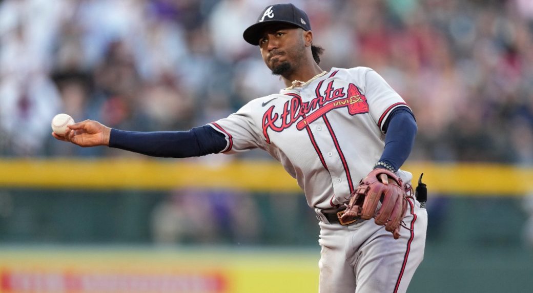 Ozzie Albies throws the ball on defense for the Atlanta Braves.