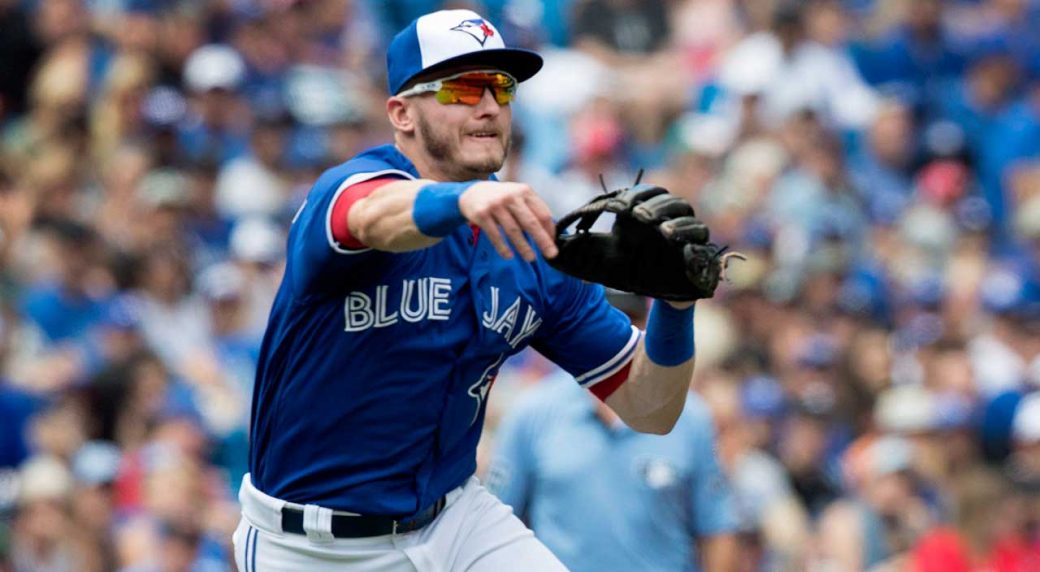 Josh Donaldson makes a throw during a home game for the Toronto Blue Jays.