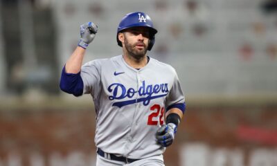 JD Martinez celebrates hitting a home run for the Los Angeles Dodgers during a road game.