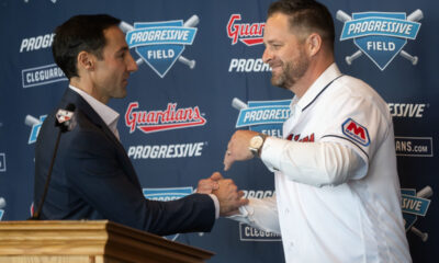 Stephen Vogt embraces Chris Antonetti during his introductory press conference.