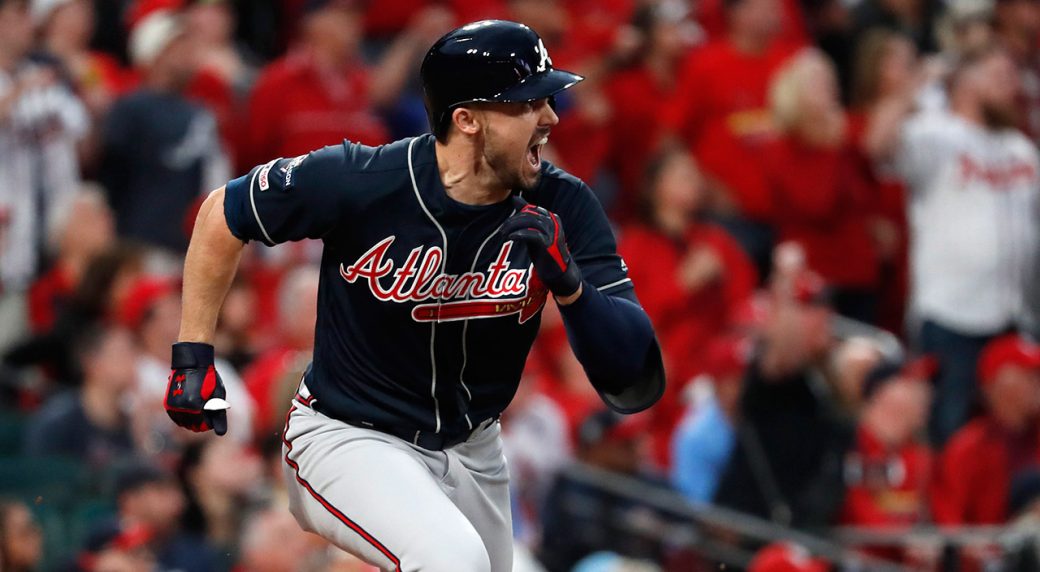 Adam Duvall celebrates while playing for the Atlanta Braves.