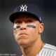 Aaron Judge looks on during a home game for the New York Yankees.