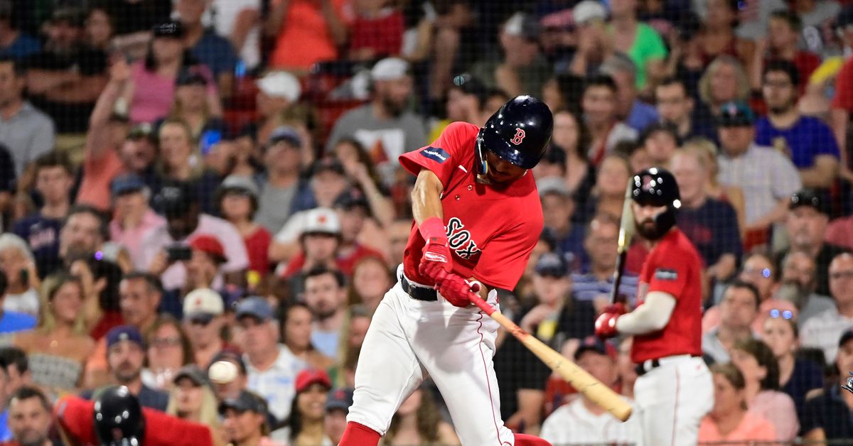 David Hamilton swings during a home game for the Boston Red Sox.