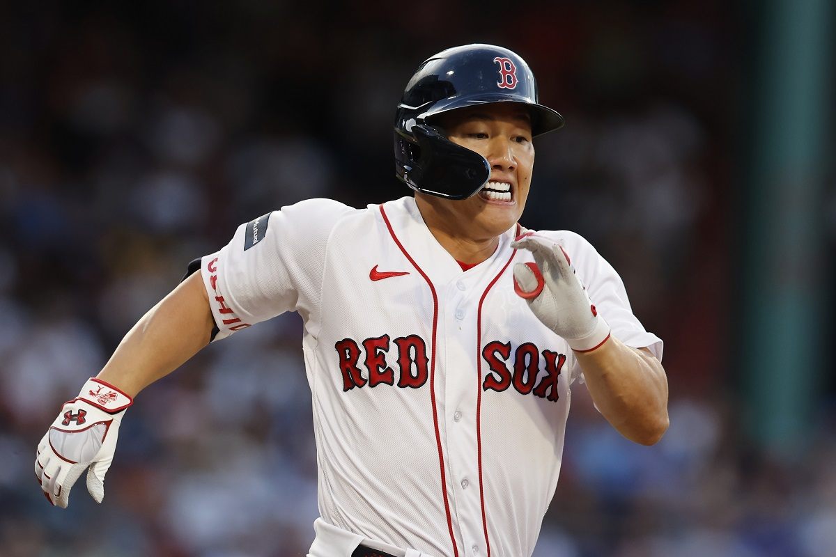 Masataka Yoshida runs the bases during a home game for the Boston Red Sox.