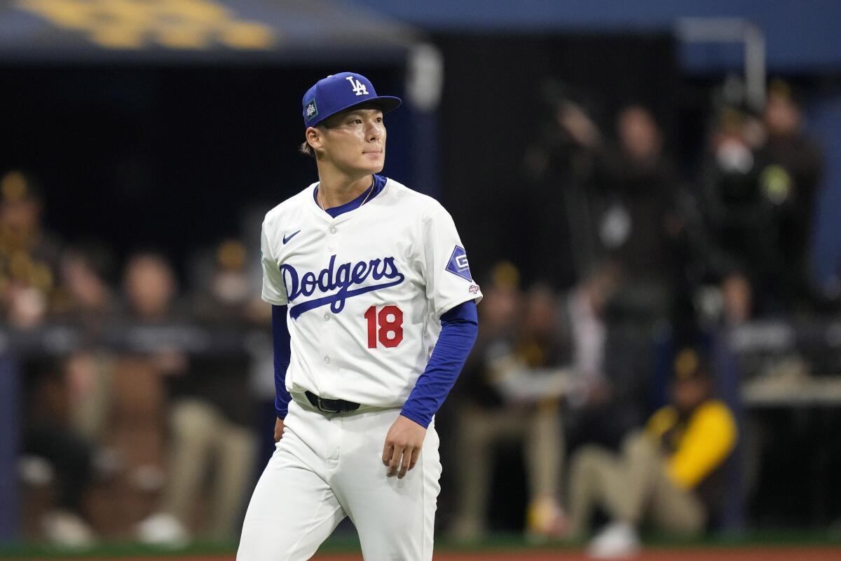 Yoshinobu Yamamoto leaves the mound during his MLB debut against the San Diego Padres.
