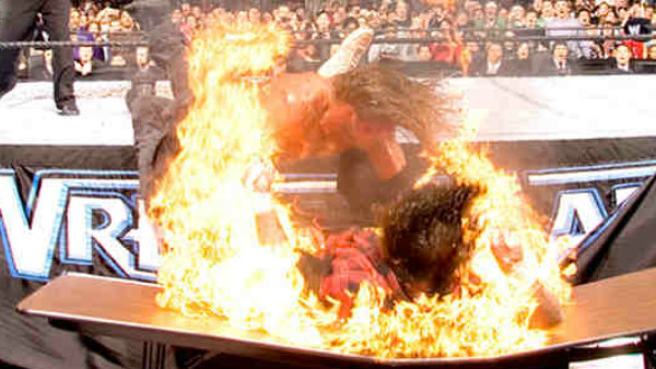 Mick Foley vs. Edge set WrestleMania 22 on fire... literally.