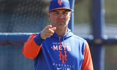 Eric Chavez points while leading a workout for the New York Mets.