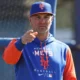 Eric Chavez points while leading a workout for the New York Mets.