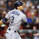 Evan Longoria swings while playing on the road for the Tampa Bay Rays.