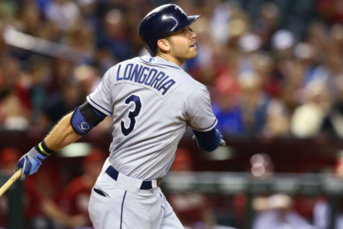 Evan Longoria swings while playing on the road for the Tampa Bay Rays.