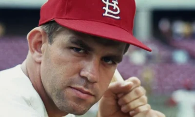 Tim McCarver poses with a bat during his playing career with the St. Louis Cardinals.